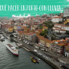 Vista aérea de Oporto con lluvia, con barcos en el río Duero y edificios coloridos.