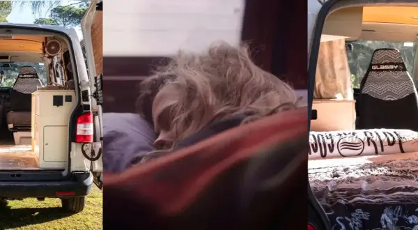 Persona durmiendo plácidamente en una furgoneta sin camperizar, lista para la aventura.